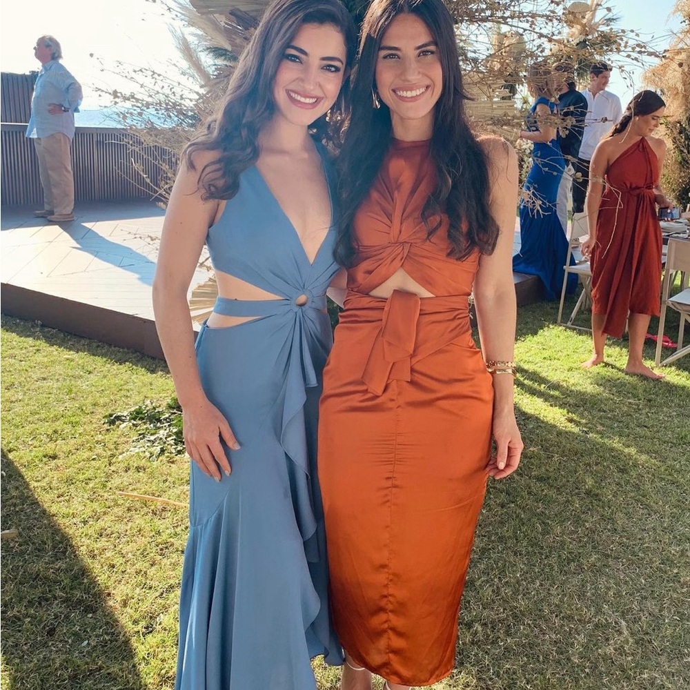 Andrea Imayah Orange midi dress